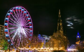 Edinburgh Christmas Market 2025 The big wheel overlooking Edinburgh Christmas Market 2025