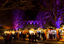 Winchester Christmas Market 2025 Wooden chalets at Winchester Christmas Market 2025 by the Cathedral