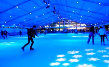 Ice Rink Canary Wharf: The Ultimate 2025/26 Visitor Guide People skating at the ice rink at canary wharf.